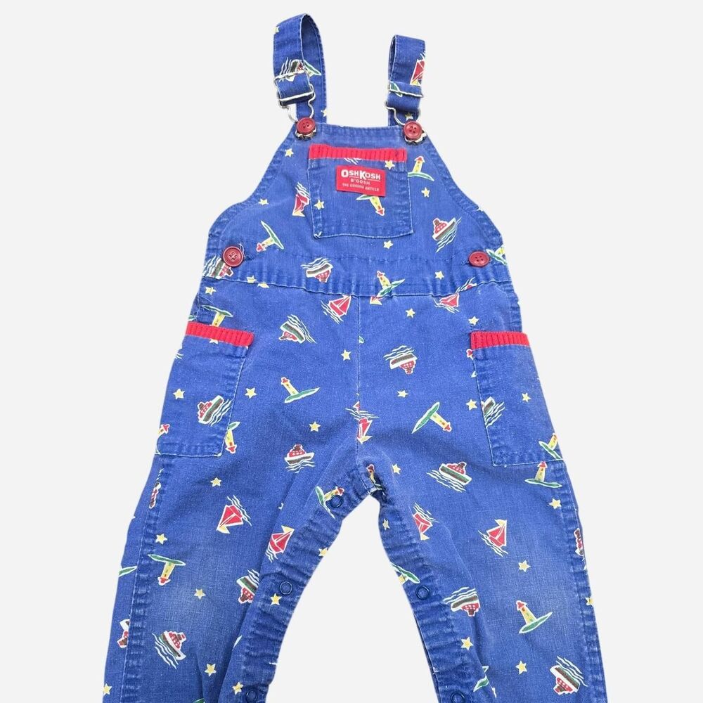 OshKosh B'gosh blue denim overalls with white & red sailboat and star print